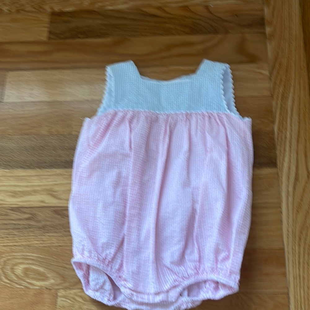 Little English bubble size 12 months but runs on larger side.